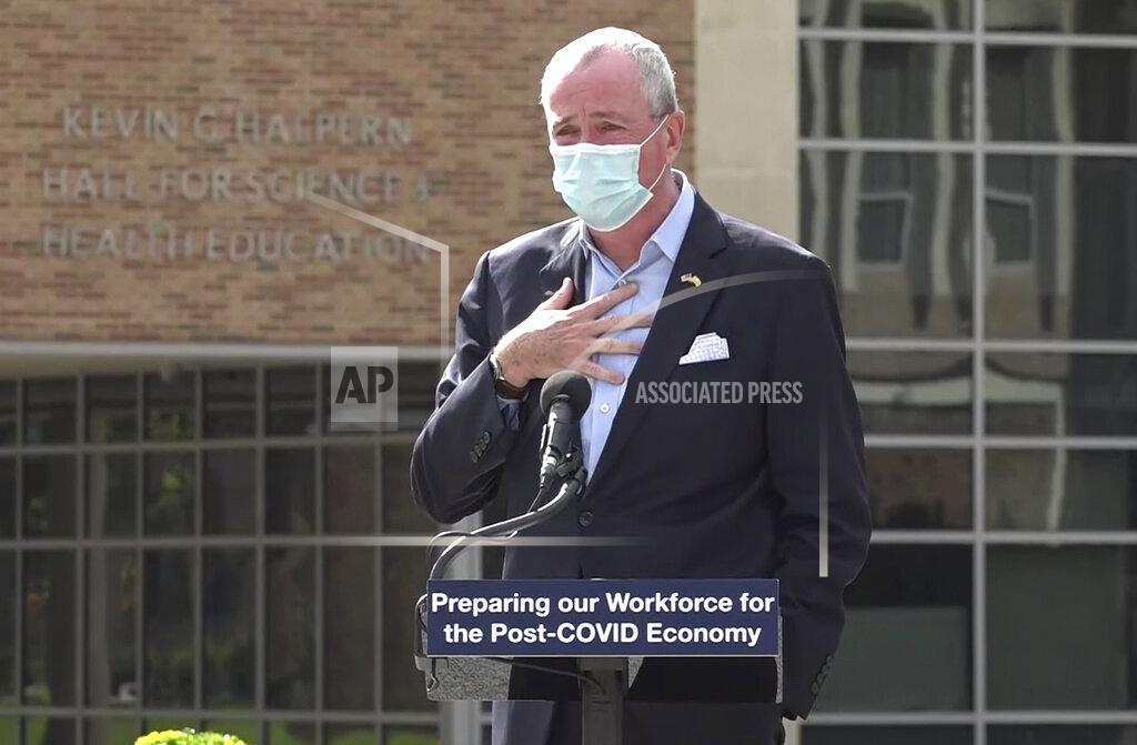 FILE - In this Oct. 21, 2020, file photo, taken from video provided by the New Jersey Governor's Office, Gov. Phil Murphy tells attendees at an event in Blackwood, N.J., that he must leave the event to quarantine after just finding out that he'd been in contact with someone who had tested positive for COVID-19. On Saturday, Oct. 24, 2020, Murphy signed an executive order to extend New Jersey's public health emergency, citing a steep increase in coronavirus cases in recent days. (New Jersey Office of the Governor via AP, File)