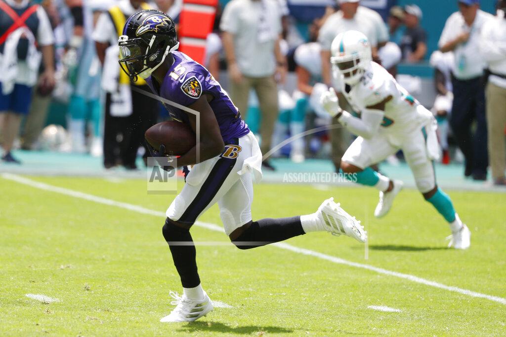 Wilfredo Lee Baltimore Ravens wide receiver Marquise Brown (15) runs for a touchdown, during the first half at an NFL football game against the Miami Dolphins, Sunday, Sept. 8, 2019, in Miami Gardens, Fla. (AP Photo/Wilfredo Lee)