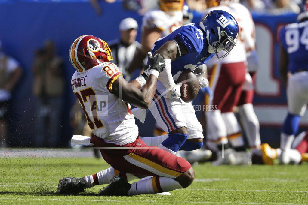 Adam Hunger New York Giants' Jabrill Peppers, right, intercepts a pass intended for Washington Redskins' Jeremy Sprinkle (87) during the second half of an NFL football game, Sunday, Sept. 29, 2019, in East Rutherford, N.J. (AP Photo/Adam Hunger)
