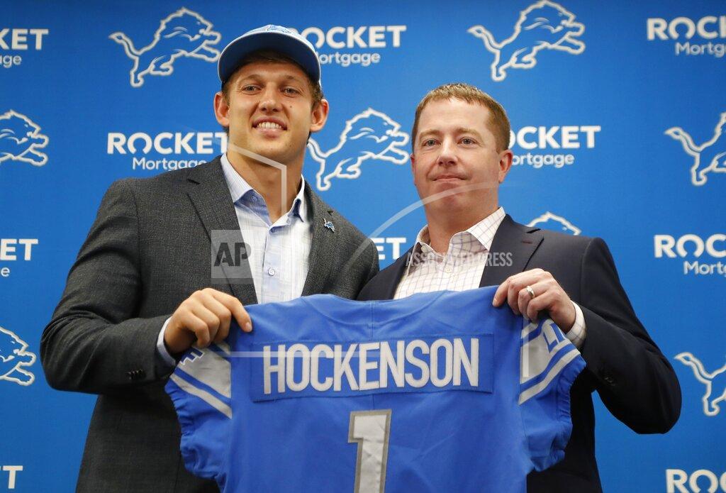 Carlos Osorio Detroit Lions first-round draft pick T.J. Hockenson, left, stands with team general manager Bob Quinn at the NFL football team's training facility, Friday, April 26, 2019, in Allen Park, Mich. (AP Photo/Carlos Osorio)