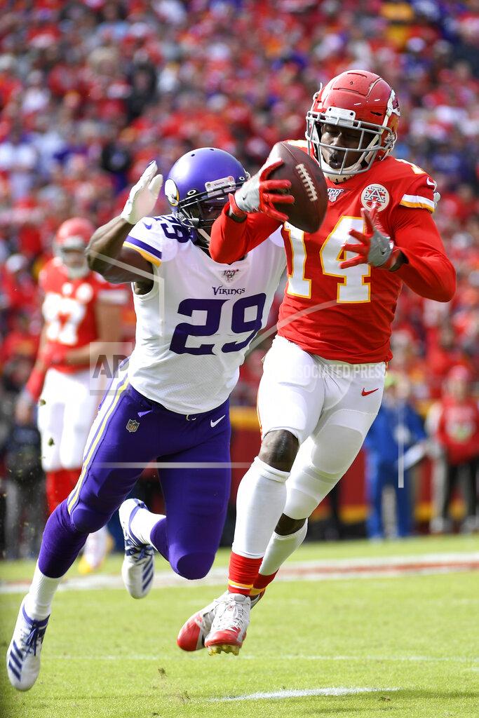 Reed Hoffmann Kansas City Chiefs wide receiver Sammy Watkins (14) makes a catch against the defense of Minnesota Vikings cornerback Xavier Rhodes (29), during the first half of an NFL football game in Kansas City, Mo., Sunday, Nov. 3, 2019. (AP Photo/Reed Hoffmann)