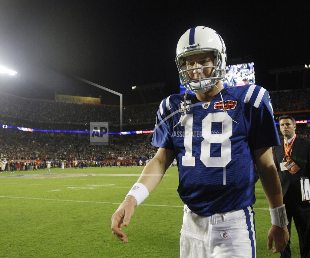 Mike Groll FILE - In this Feb. 7, 2010, file photo, Indianapolis Colts quarterback Peyton Manning (18) walks off the field after the NFL Super Bowl XLIV football game against the New Orleans Saints, in Miami. The Saints won 31-17. As part of its celebration of its 100th season, the NFL is designating a Game of the Week, each chosen to highlight a classic matchup. For this week, it is the Colts-Saints game. (AP Photo/Mike Groll, File)