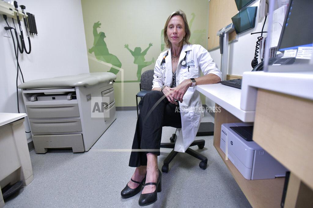 Dr. Katherine Gergen Barnett, Program Director of Family Medicine Residency at Boston Medical Center, Thursday, June 3, 2021. States, such as Massachusetts, with high vaccination rates are reporting plunging COVID-19 cases, multiple days without deaths and health care workers who've gone weeks without treating a patient. (AP Photo/Josh Reynolds)
