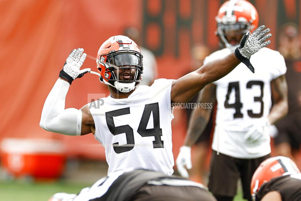 Ron Schwane Cleveland Browns linebacker Anthony Walker signals a penalty against the offense during NFL football practice at the team's training facility, Wednesday, June 9, 2021, in Berea, Ohio. (AP Photo/Ron Schwane)