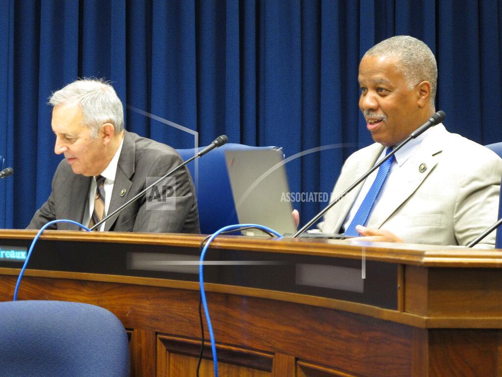 Melinda Deslatte Senators Mark Abraham, R-Lake Charles, left, and Gerald Boudreaux, D-Lafayette, listen to a discussion of the Senate's budget proposal during a meeting of the Senate Finance Committee on Monday, May 24, 2021, in Baton Rouge, La. (AP Photo/Melinda Deslatte)