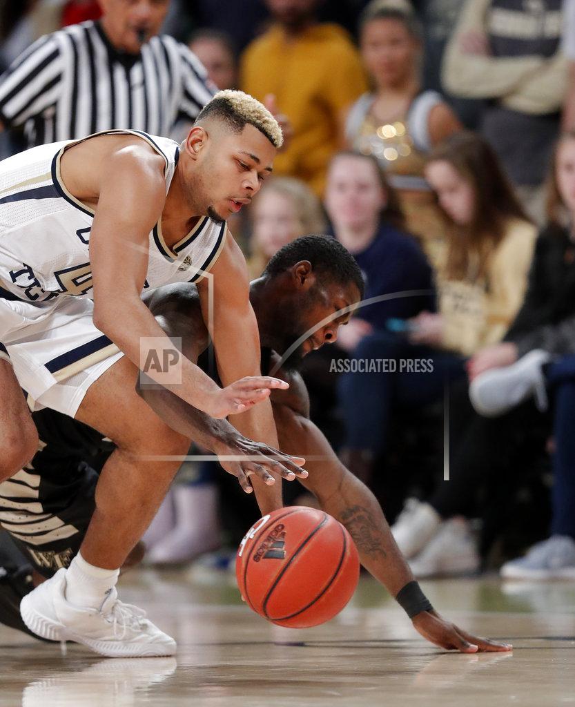 John Bazemore Georgia Tech guard Brandon Alston (4) and Wake Forest guard Chaundee Brown (23) battle for the ball during the second half of an NCAA college basketball game, Saturday, Jan. 5, 2019, in Atlanta. (AP Photo/John Bazemore)