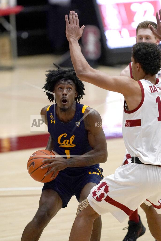 Tony Avelar California guard Joel Brown (1) drives to the basket against Stanford forward Oscar da Silva (13) during the first half of an NCAA college basketball game in Stanford, Calif., Sunday, Feb. 7, 2021. (AP Photo/Tony Avelar)