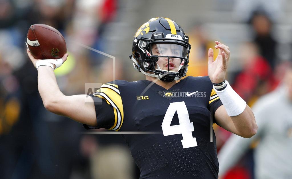 Charlie Neibergall Iowa quarterback Nate Stanley warms up before an NCAA college football game against Nebraska, Friday, Nov. 23, 2018, in Iowa City, Iowa. (AP Photo/Charlie Neibergall)