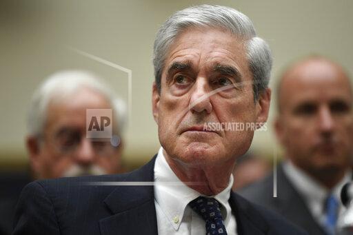 FILE - Former special counsel Robert Mueller testifies on Capitol Hill in Washington before the House Judiciary Committee hearing on his report on Russian election interference on July 24, 2019. A federal appeals court on Tuesday, Nov. 30, 2021, directed the Justice Department to disclose certain redacted passages from special counsel Robert Mueller's Russia investigation report that relate to individuals who were investigated by prosecutors but not ultimately charged. (AP Photo/Susan Walsh, File)