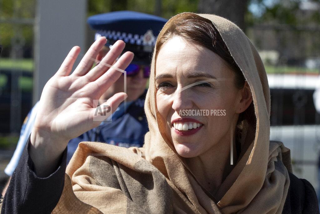 Mark Baker FILE - In this Sept. 24, 2020, file photo, New Zealand Prime Minister Jacinda Ardern waves as she walks from the Al Noor mosque in Christchurch, New Zealand where she unveiled a memorial plaque in memory of the victims of the March 15, 2019 Christchurch terror attack. Opinion polls indicate Ardern is on track to win a second term as prime minister in a general election scheduled for Saturday, Oct. 17, 2020. (AP Photo/Mark Baker, File)