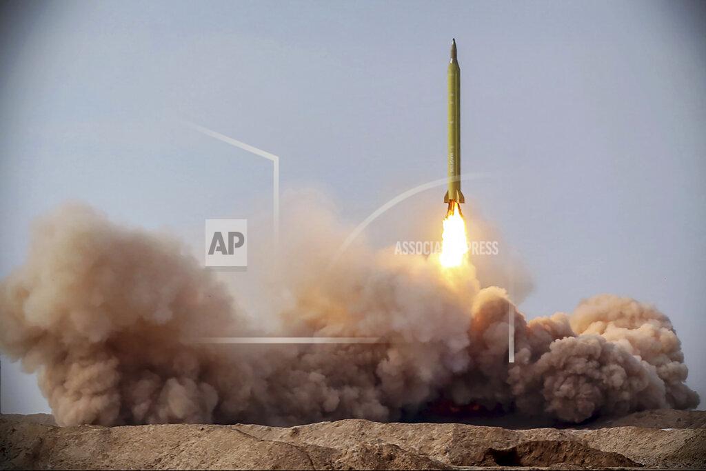 Uncredited FILE - In this file photo released Jan. 16, 2021, by the Iranian Revolutionary Guard, a missile is launched in a drill in Iran. The Biden administration’s early efforts to resurrect the 2015 Iran nuclear deal are getting a chilly early response from Tehran. Though few expected a breakthrough in the first month of the new administration, Iran’s tough line suggests a difficult road ahead.(Iranian Revolutionary Guard/Sepahnews via AP, File)