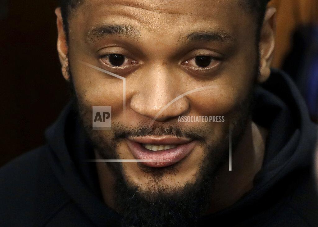 Steven Senne New England Patriots strong safety Patrick Chung speaks with reporters in the team's locker room following an NFL football practice Monday, Aug. 26, 2019, in Foxborough, Mass. (AP Photo/Steven Senne)