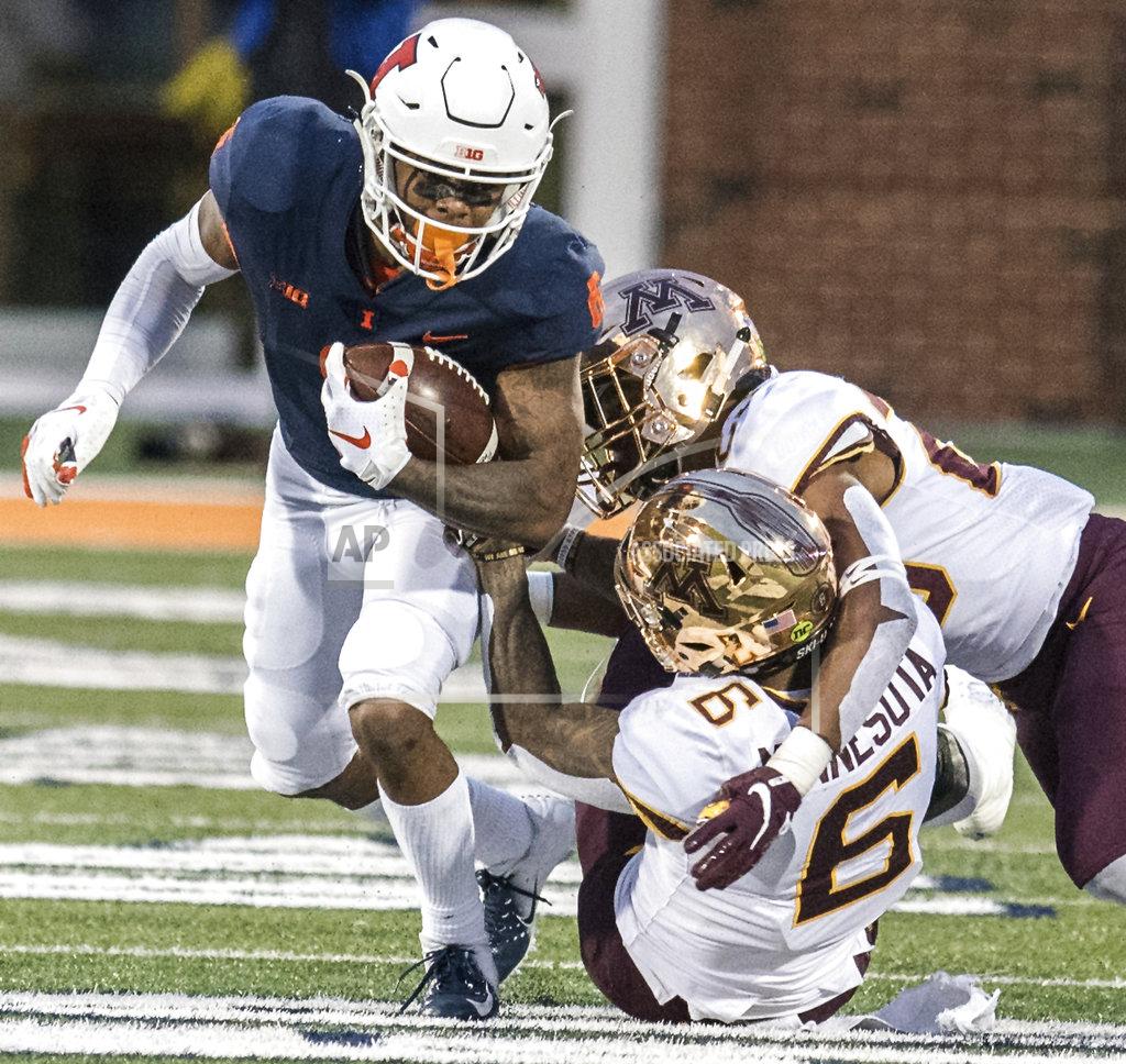 Holly Hart Illinois wide receiver Dominic Stampley (6) is tackled after making a catch in the second half of a NCAA college football game against Minnesota, Saturday, Nov. 3, 2018, in Champaign, Ill. (AP Photo/Holly Hart)