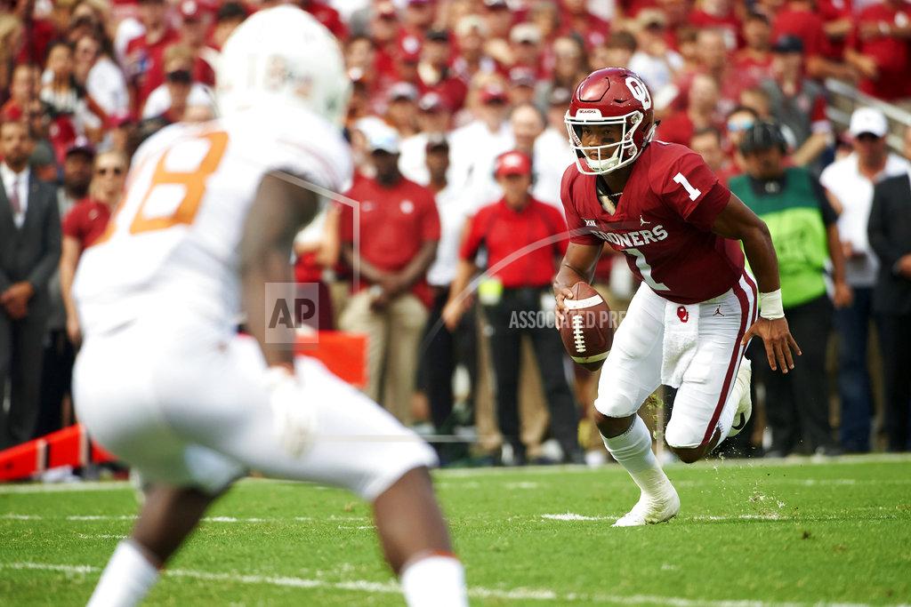 Cooper Neill Oklahoma quarterback Kyler Murray (1) scrambles against Texas during the first half of an NCAA college football game at the Cotton Bowl, Saturday, Oct. 6, 2018, in Dallas. (AP Photo/Cooper Neill)