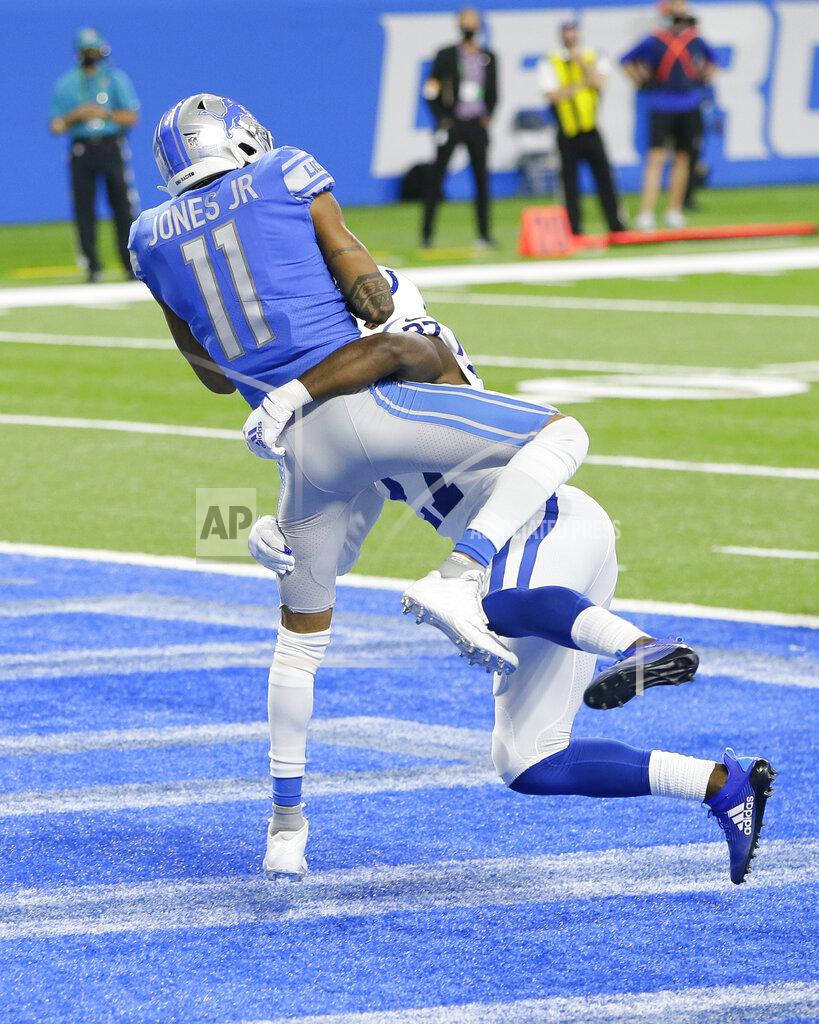 Duane Burleson Detroit Lions wide receiver Marvin Jones (11) catches a 4-yard pass for a touchdown while Indianapolis Colts cornerback Xavier Rhodes (27) defends during the second half of an NFL football game, Sunday, Nov. 1, 2020, in Detroit. (AP Photo/Duane Burleson)