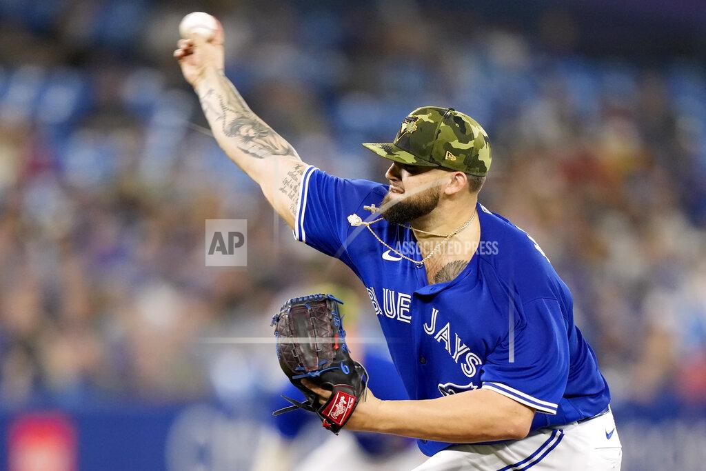 Frank Gunn Toronto Blue Jays starting pitcher Alek Manoah (6) works against the Cincinnati Reds during the first inning of a baseball game in Toronto, Saturday, May 21, 2022. (Frank Gunn/The Canadian Press via AP)