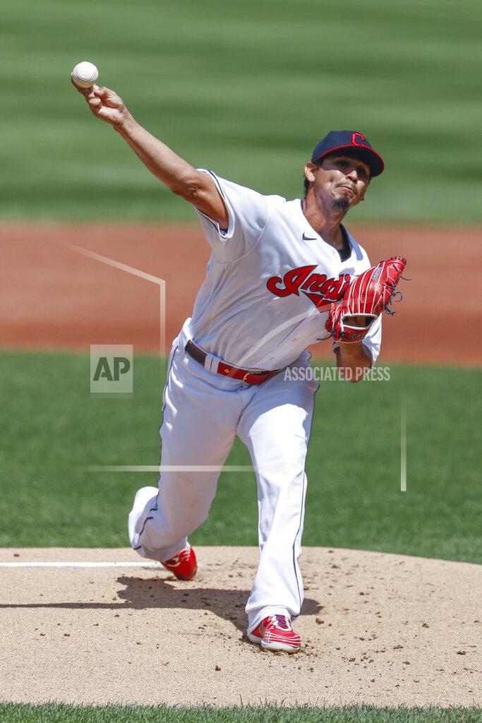 Ron Schwane Cleveland Indians starting pitcher Carlos Carrasco delivers against the Detroit Tigers during the first inning of a baseball game, Sunday, Aug. 23, 2020, in Cleveland. (AP Photo/Ron Schwane)