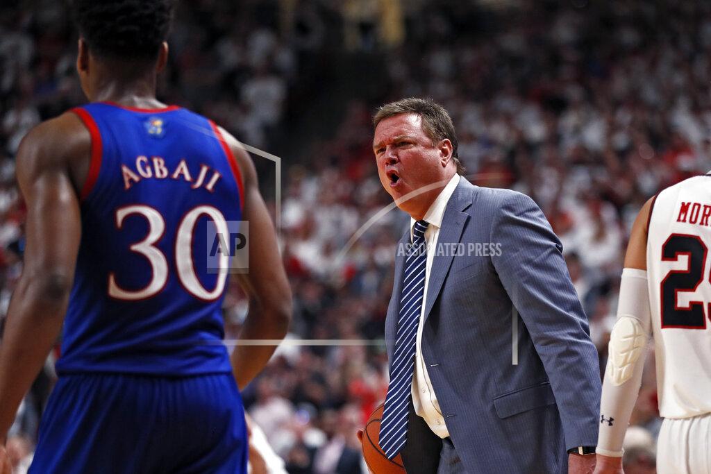 Brad Tollefson Kansas coach Bill Self yells at Ochai Agbaji (30) after he let the ball go out of bounds during the second half of an NCAA college basketball game against Texas Tech, Saturday, March 7, 2020, in Lubbock, Texas. (AP Photo/Brad Tollefson)