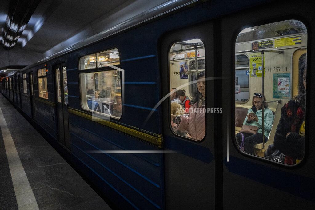 Bernat Armangue Commuters take the subway in Kharkiv, eastern Ukraine, Tuesday, May 24, 2022. Kharkiv subway resumed service on Tuesday morning after it was closed for more than two months during Russian attempt to capture the city. (AP Photo/Bernat Armangue)