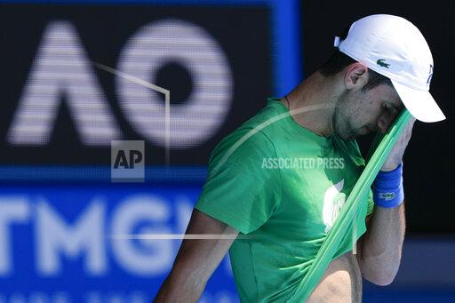 Defending men's champion Serbia's Novak Djokovic practices on Margaret Court Arena ahead of the Australian Open tennis championship in Melbourne, Australia, Thursday, Jan. 13, 2022. AP Photo/Mark Baker)