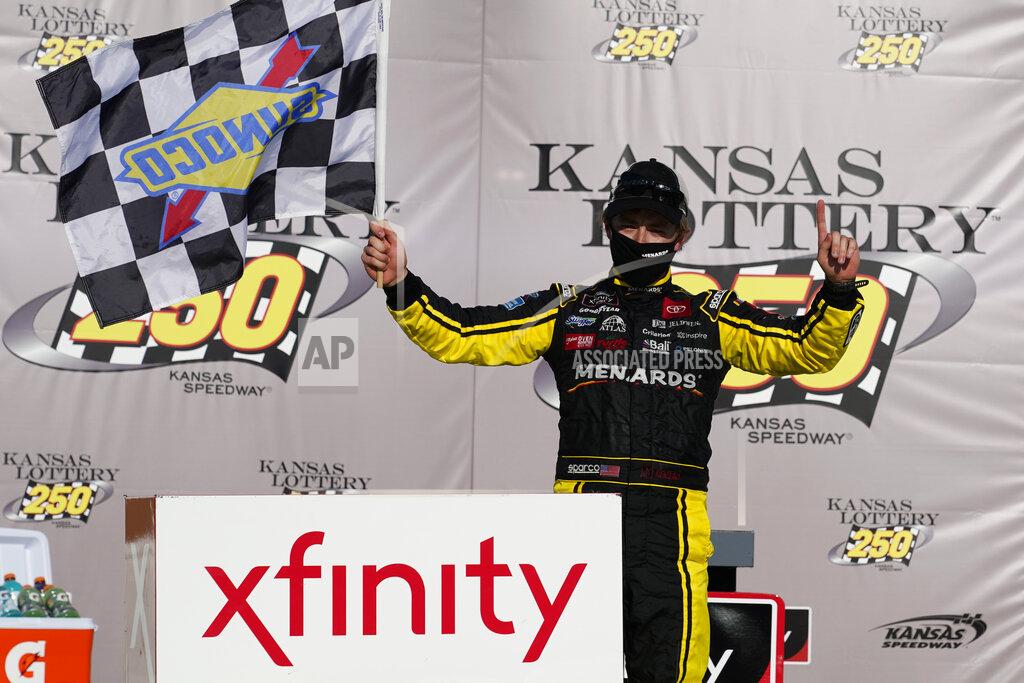 Charlie Riedel Brandon Jones celebrates after winning a NASCAR Xfinity Series auto race at Kansas Speedway in Kansas City, Kan., Saturday, July 25, 2020. (AP Photo/Charlie Riedel)