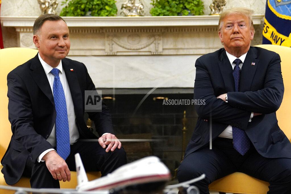 Evan Vucci President Donald Trump meets with Polish President Andrzej Duda in the Oval Office of the White House, Wednesday, June 24, 2020, in Washington. (AP Photo/Evan Vucci)