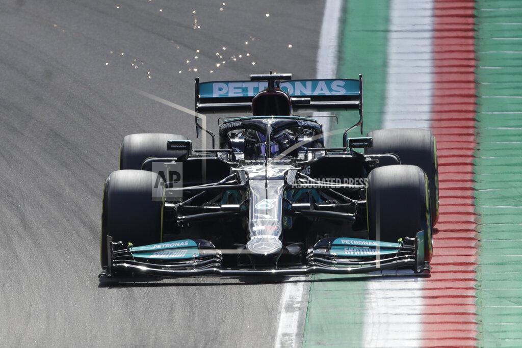 Luca Bruno Mercedes driver Lewis Hamilton of Britain steers his car during the second free practice session for Sunday's Emilia Romagna Formula One Grand Prix, at the Imola track, Italy, Friday, April 16, 2021. (AP Photo/Luca Bruno)