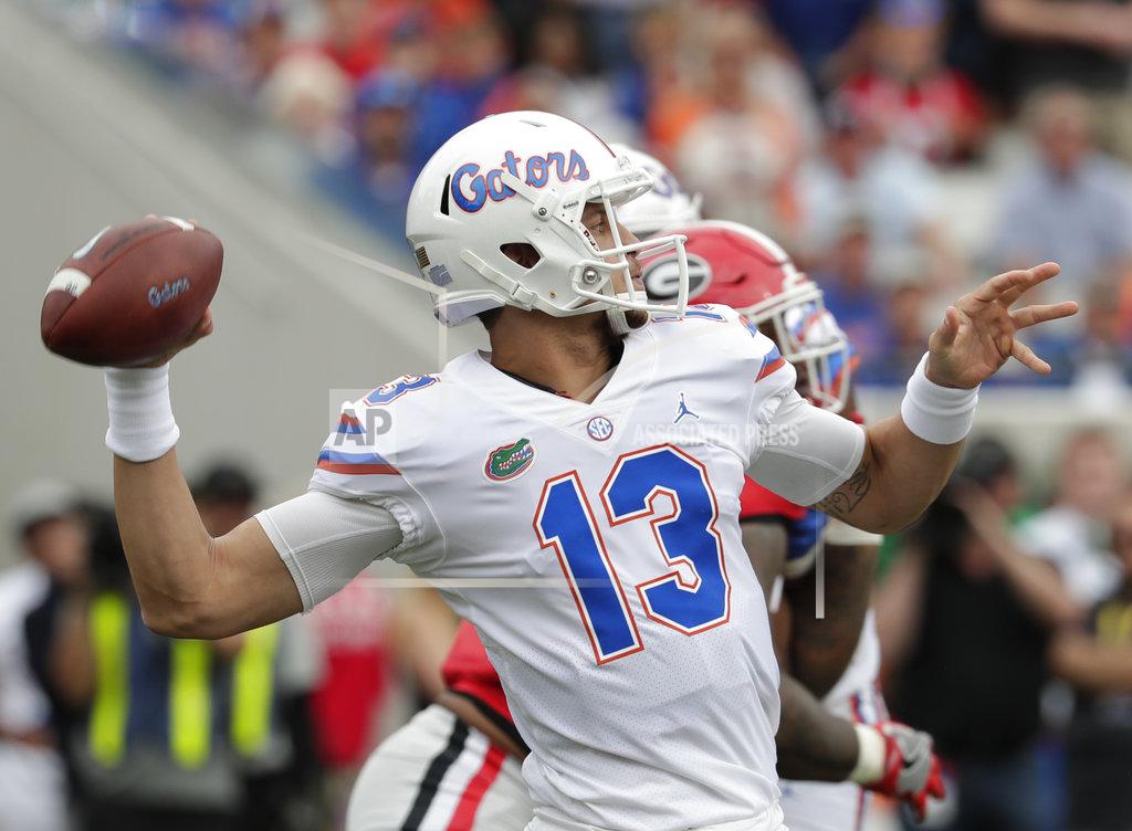 John Raoux Florida quarterback Feleipe Franks looks to pass against Georgia during the first half of an NCAA college football game Saturday, Oct. 27, 2018, in Jacksonville, Fla. (AP Photo/John Raoux)