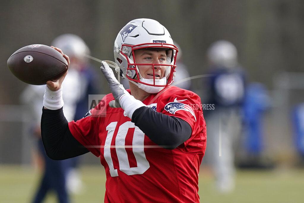 New England Patriots quarterback Mac Jones (10) throws a pass during an NFL football practice, Wednesday, Dec.15, 2021, in Foxborough, Mass. (AP Photo/Steven Senne)