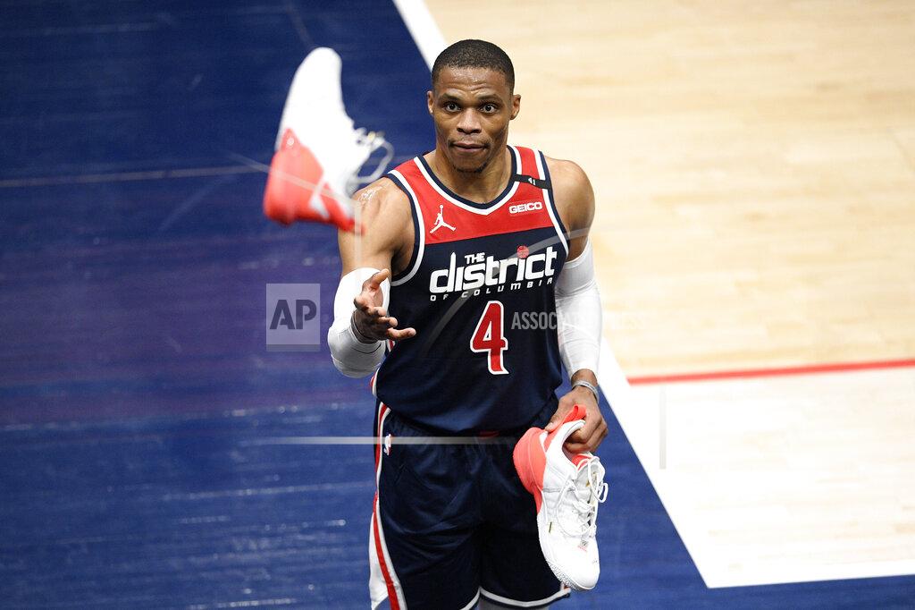 Nick Wass Washington Wizards guard Russell Westbrook throws his shoe into the stands after the team's NBA basketball game against the Cleveland Cavaliers, Friday, May 14, 2021, in Washington.(AP Photo/Nick Wass)