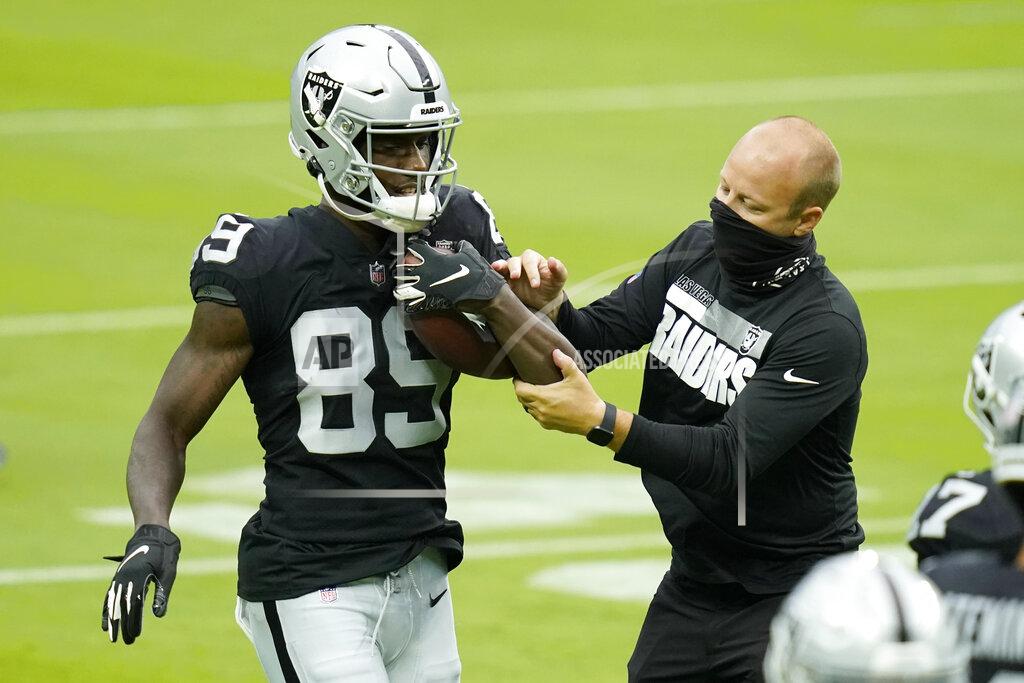 John Locher Las Vegas Raiders wide receiver Bryan Edwards (89) runs a drill during an NFL football training camp practice Friday, Aug. 21, 2020, in Las Vegas. (AP Photo/John Locher)