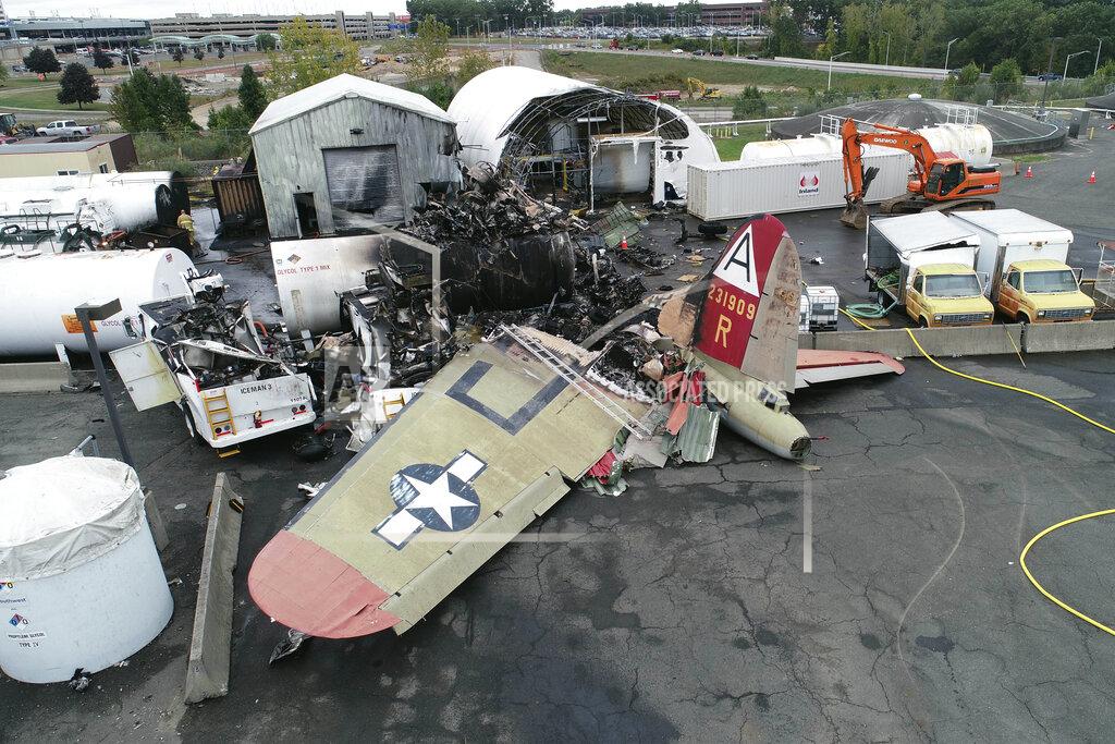 Uncredited This photo, provided by the National Transportation Safety Board, shows damage from a World War II-era B-17 bomber plane that crashed on Oct. 2, 2019, at Bradley International Airport in Windsor Locks, Conn. Pilot error was the probable cause of the 2019 crash that killed seven people and wounded six others, the National Transportation Safety Board said in a report released Tuesday, April 13, 2021, that also cited inadequate maintenance as a contributing factor. (NTSB via AP, File)