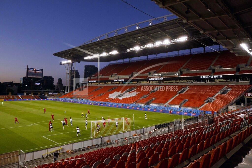 Cole Burston Empty stadium seats are seen and a banner that says 'Black Lives Matter' is displayed as the Toronto FC play the Vancouver Whitecaps during first half MLS soccer action at BMO field in Toronto, Tuesday, Aug. 18, 2020. (Cole Burston/The Canadian Press via AP)