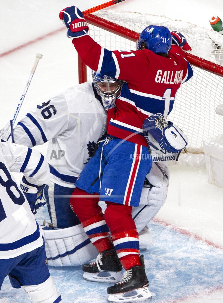 Ryan Remiorz Montreal Canadiens right wing Brendan Gallagher (11) becomes entangled with Toronto Maple Leafs goaltender Jack Campbell (36) during the second period of Game 6 of an NHL hockey Stanley Cup first-round playoff seres Saturday, May 29, 2021, in Montreal. (Ryan Remiorz/The Canadian Press via AP