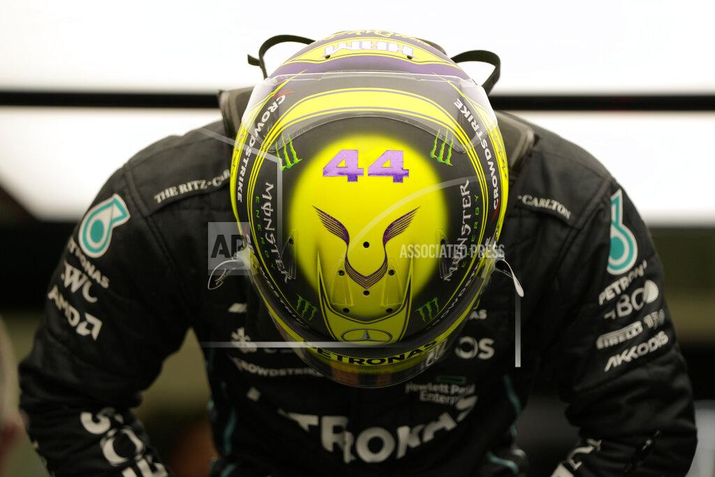 Hassan Ammar Mercedes driver Lewis Hamilton of Britain prepares during a practice for theFormula One Bahrain Grand Prix it in Sakhir, Bahrain, Friday, March 18, 2022. (AP Photo/Hassan Ammar)