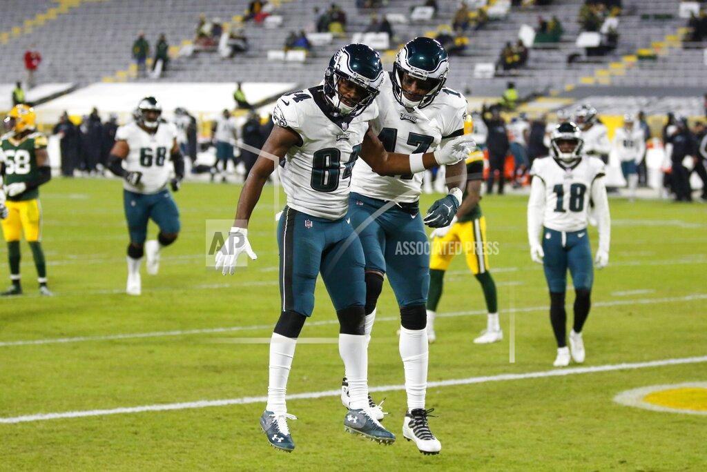 Matt Ludtke Philadelphia Eagles' Greg Ward (84) celebrates his touchdown catch with Alshon Jeffery (17) during the second half of an NFL football game against the Green Bay Packers Sunday, Dec. 6, 2020, in Green Bay, Wis. (AP Photo/Matt Ludtke)