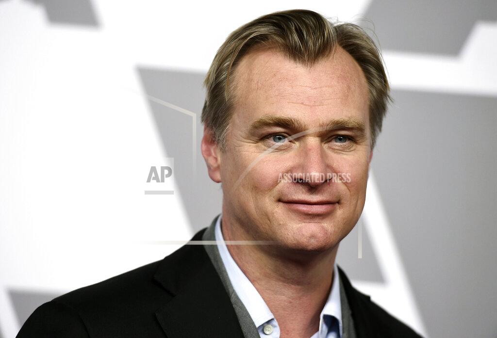 Jordan Strauss FILE - This Feb. 5, 2018 file photo shows director Christopher Nolan at the 90th Academy Awards Nominees Luncheon in Beverly Hills, Calif. Nolan's film "Tenet" is the first major Hollywood film in the COVID-era to open in U.S. cinemas in almost six months. Nolan says he is pleased with Warner Bros.' slow, patient roll out of the film, which opens in the U.S. this week. (Photo by Jordan Strauss/Invision/AP, File)