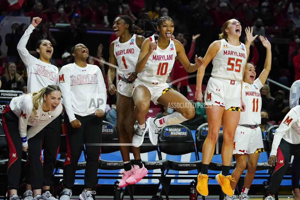 Julio Cortez Maryland players react after guard Taisiya Kozlova scored a basket against Florida Gulf Coast during the second half of a college basketball game in the second round of the NCAA tournament, Sunday, March 20, 2022, in College Park, Md. Maryland won 89-65. (AP Photo/Julio Cortez)