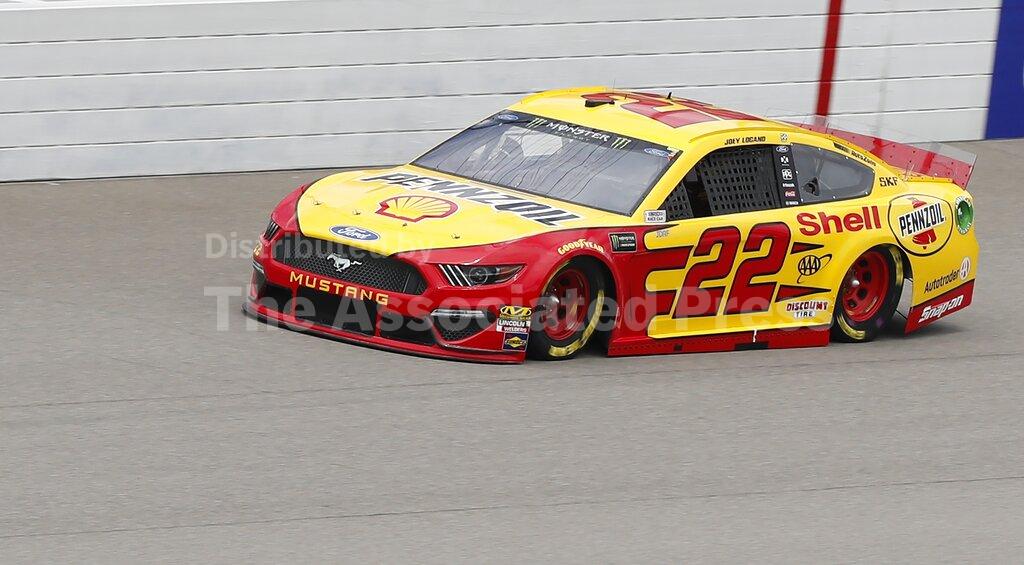 Joey Logano drives enroute to the pole during qualifying for the NASCAR cup series race at Michigan International Speedway, Saturday, June 8, 2019, in Brooklyn, Mich. (AP Photo/Carlos Osorio)