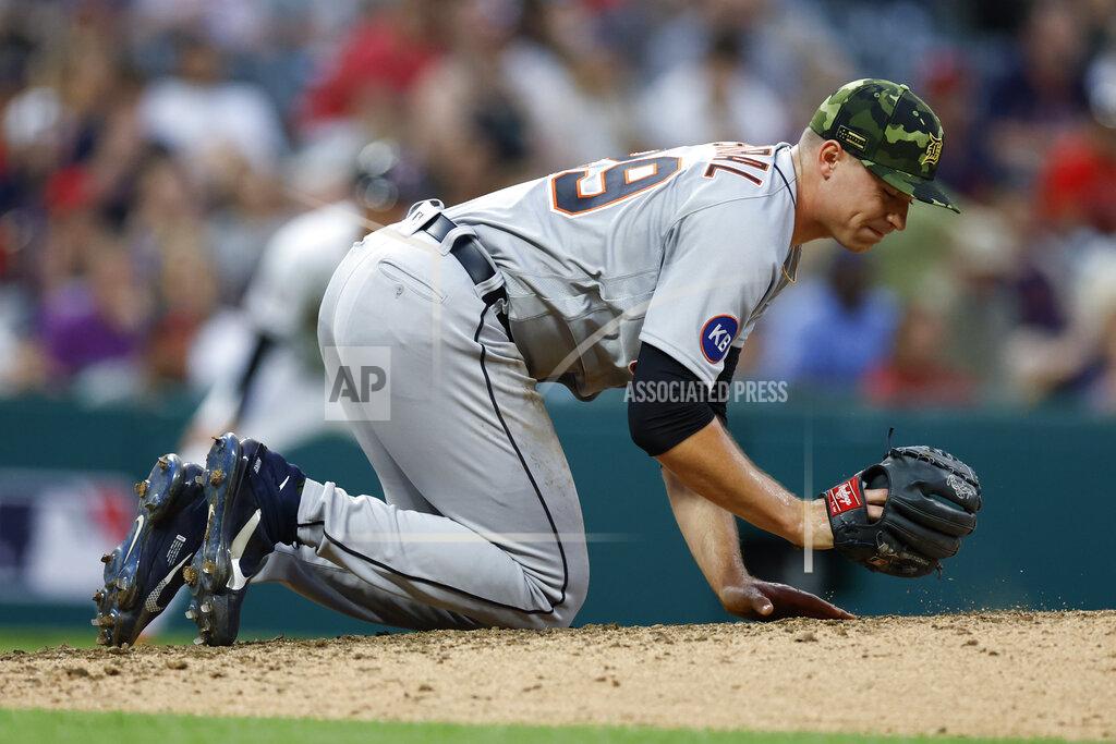 Ron Schwane Detroit Tigers starting pitcher Tarik Skubal kneels on the mound after being hit by a ball off the bat of Cleveland Guardians' Ernie Clement during the fifth inning of a baseball game, Friday, May 20, 2022, in Cleveland. (AP Photo/Ron Schwane)