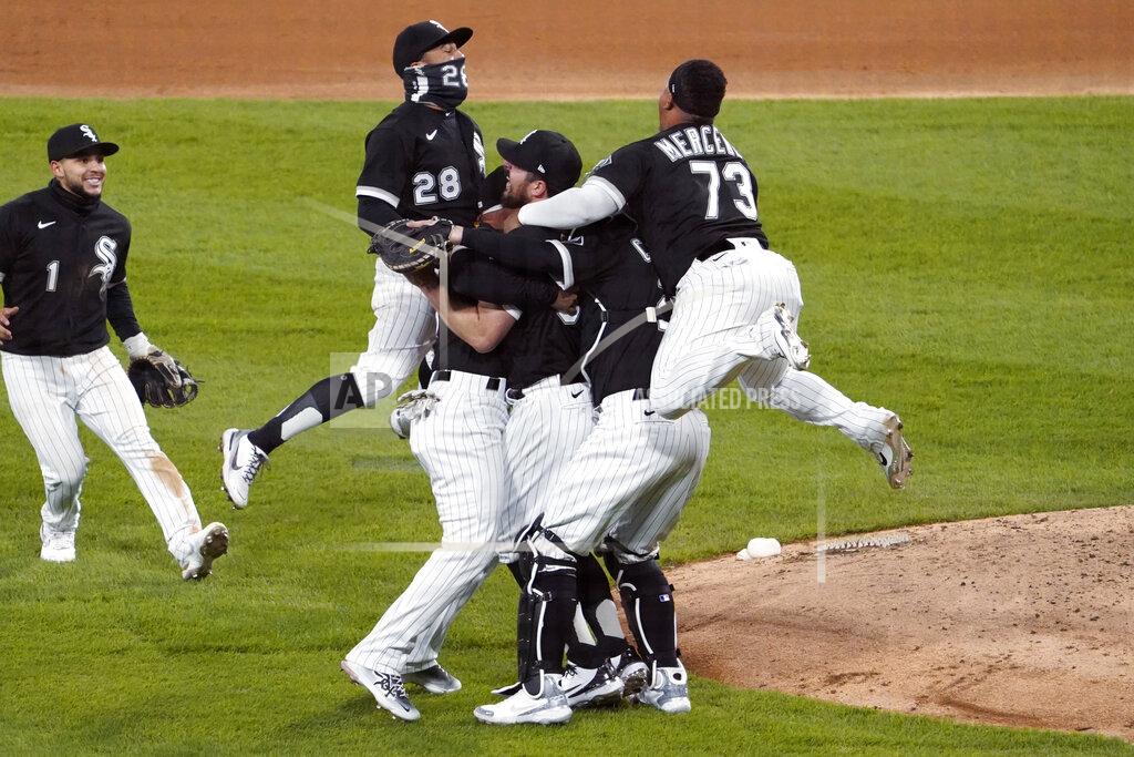 David Banks Chicago White Sox starting pitcher Carlos Rodon, center, celebrates his no hitter against the Cleveland Indians with his teammates in a baseball game, Wednesday, April, 14, 2021, in Chicago. (AP Photo/David Banks)
