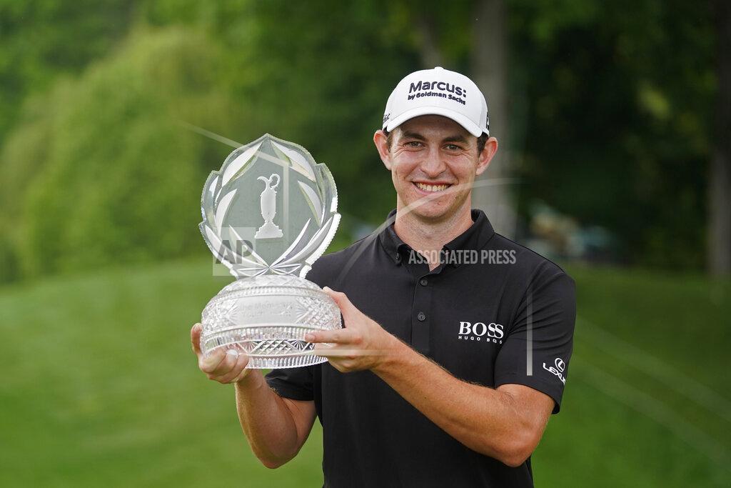 Darron Cummings Patrick Cantlay holds the trophy after winning the Memorial golf tournament, Sunday, June 6, 2021, in Dublin, Ohio. (AP Photo/Darron Cummings)