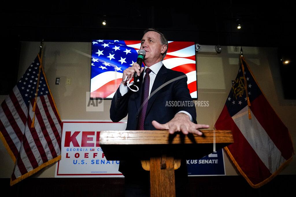 Republican candidate for U.S. Senate Sen. David Perdue speaks during a campaign rally on Friday, Nov. 13, 2020, in Cumming, Ga. Perdue and Democratic candidate Jon Ossoff are in a runoff election for the Senate seat in Georgia. (AP Photo/Brynn Anderson)