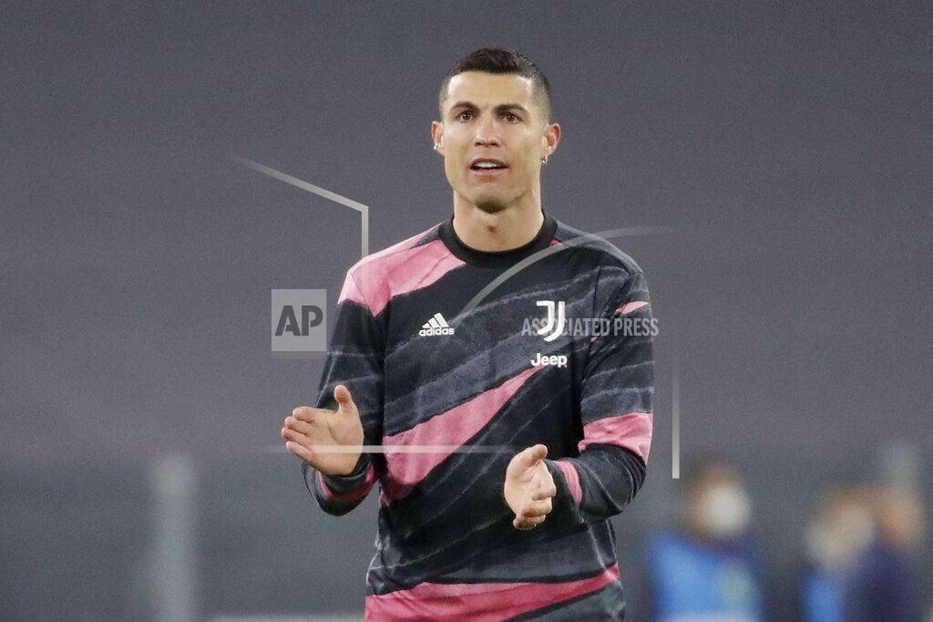 Luca Bruno Juventus' Cristiano Ronaldo applauds during warmup before the Champions League, round of 16, second leg, soccer match between Juventus and Porto in Turin, Italy, Tuesday, March 9, 2021. (AP Photo/Luca Bruno)