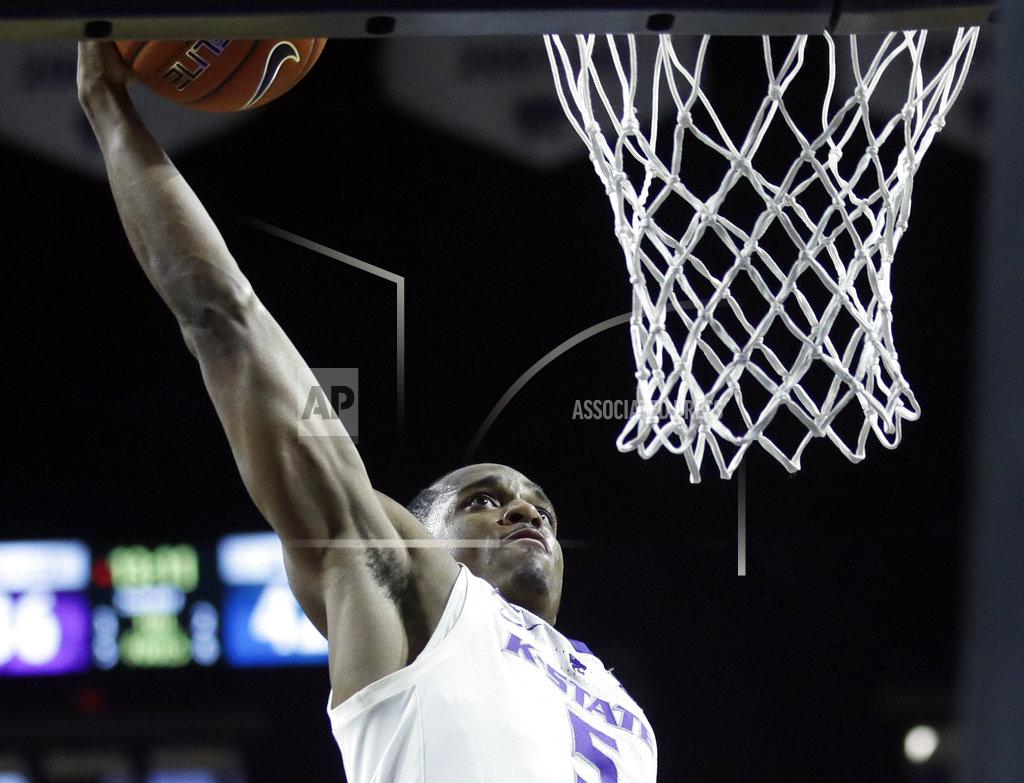 Orlin Wagner Kansas State guard Barry Brown Jr. dunks during the second half of the team's NCAA college basketball game against West Virginia in Manhattan, Kan., Wednesday, Jan. 9, 2019. (AP Photo/Orlin Wagner)