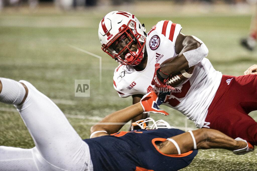 Holly Hart Nebraska's JD Spielman (10) is brought down by Illinois' Nolan Bernat (28) in the first half of an NCAA college football game, Saturday, Sept. 21, 2019, in Champaign, Ill. (AP Photo/Holly Hart)