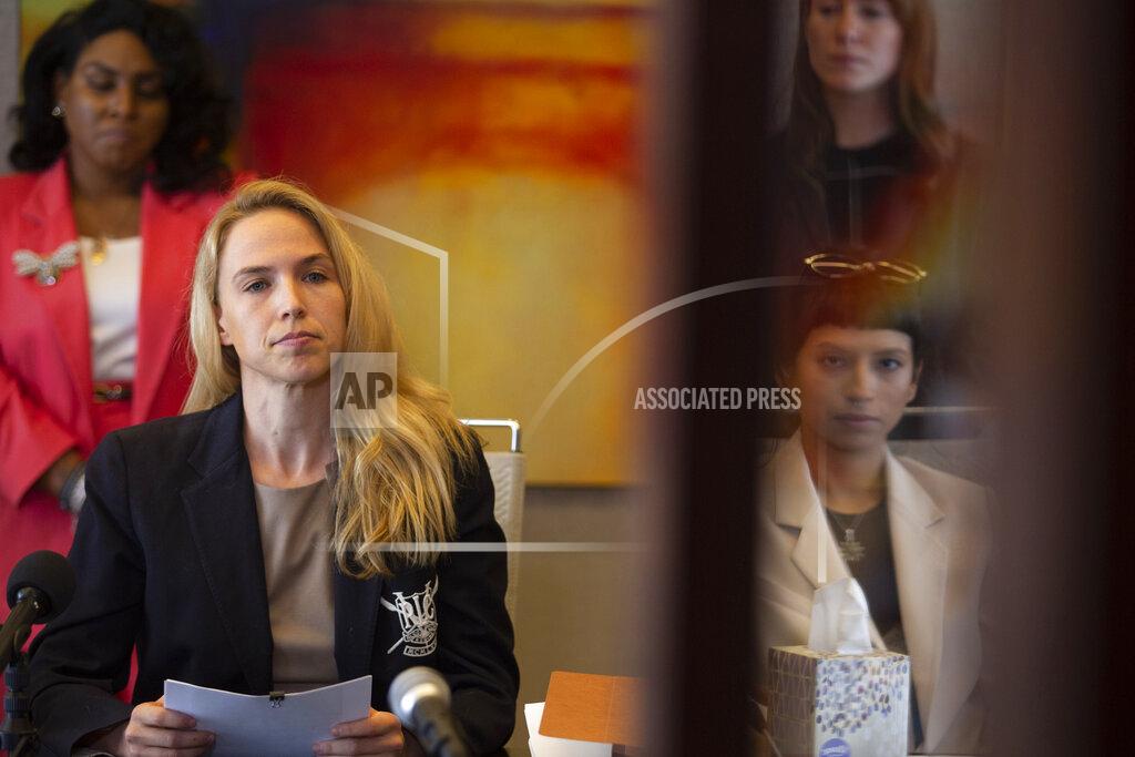 Yi-Chin Lee Attorney Cornelia Brandfield-Harvey, left, reads a statement by another accuser of the sexual assault allegations against Houston Texans quarterback Deshaun Watson during a news conference, Tuesday, April 6, 2021, in Houston. (Yi-Chin Lee/Houston Chronicle via AP)