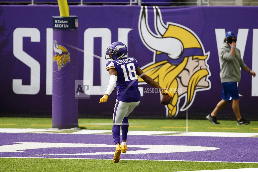 Bruce Kluckhohn Minnesota Vikings wide receiver Justin Jefferson celebrates during a a 71-yard touchdown catch during the second half of an NFL football game against the Tennessee Titans, Sunday, Sept. 27, 2020, in Minneapolis. (AP Photo/Bruce Kluckhohn)