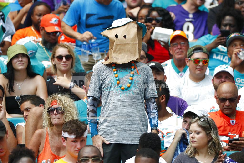 Wilfredo Lee A Miami Dolphins fan shows his displeasure with the team, during the first half at an NFL football game against the Baltimore Ravens, Sunday, Sept. 8, 2019, in Miami Gardens, Fla. (AP Photo/Wilfredo Lee)