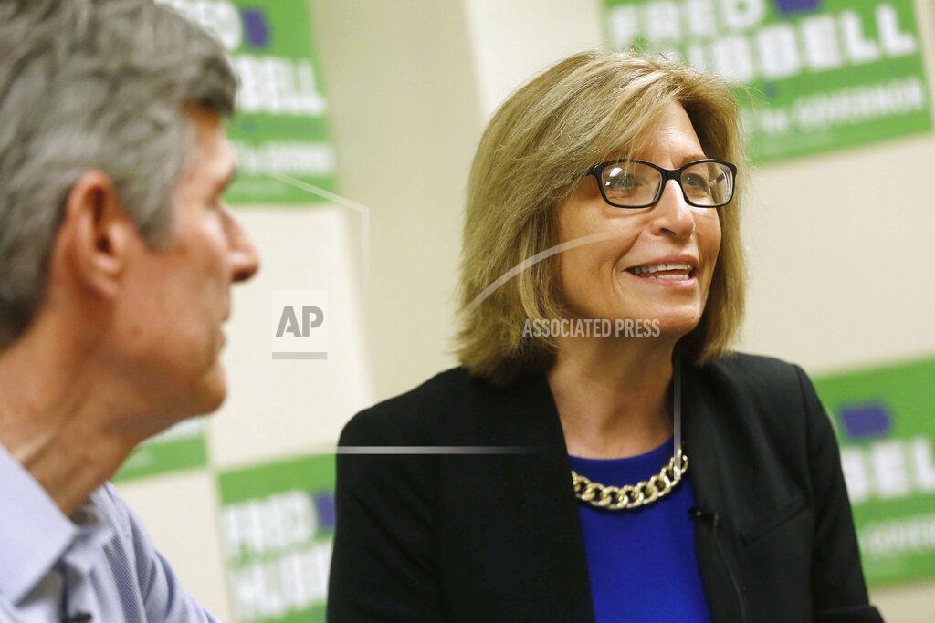 Michael Zamora FILE - In this June 16, 2018 file photo, State. Sen. Rita Hart, right, answers questions, as she and Fred Hubbell, Democratic candidate for governor, talk with the Register. Hart is running in the Nov. 3, 2020, general election for the congressional seat left open by the retirement of longtime Democratic Rep. Dave Loebsack, of Iowa City. (Rebecca F. Miller/The Gazette via AP) (Michael Zamora/The Des Moines Register via AP, File)